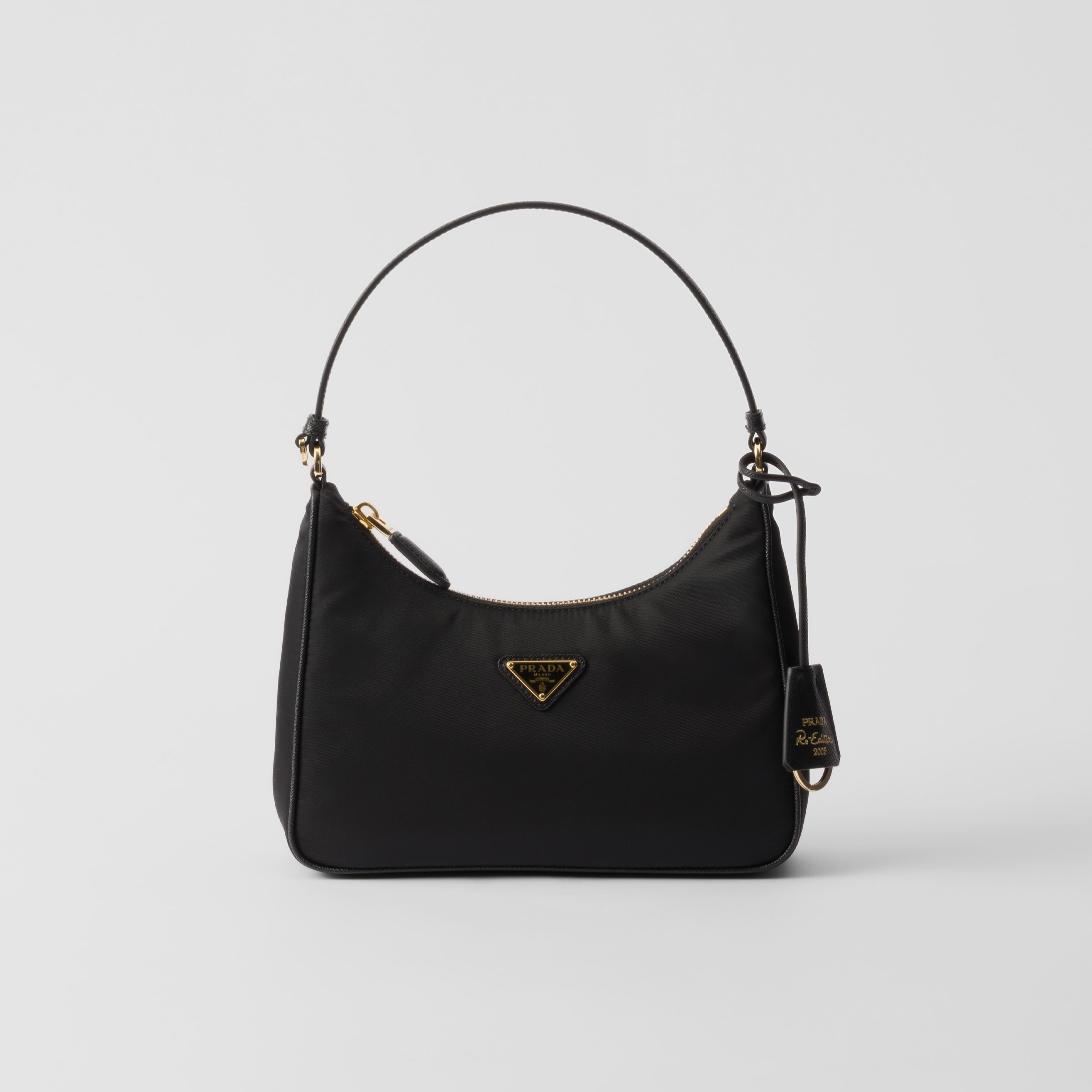 RE-EDITION 2005 RE-NYLON AND SAFFIANO MINI BAG, RECYCLED POLYAMIDE – BLACK / GOLD