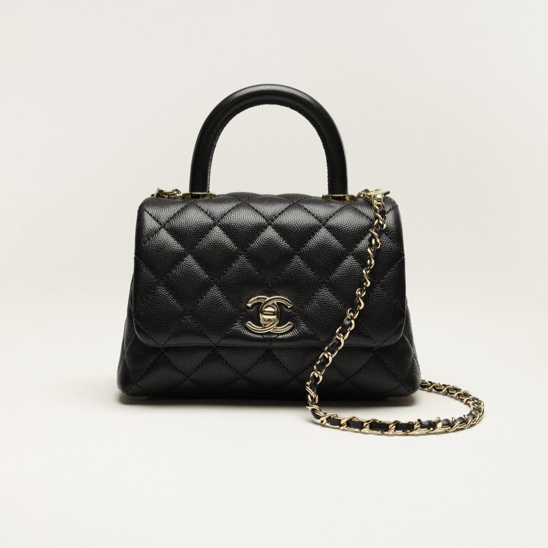 MINI FLAP BAG WITH TOP HANDLE, GRAINED CALFSKIN – BLACK